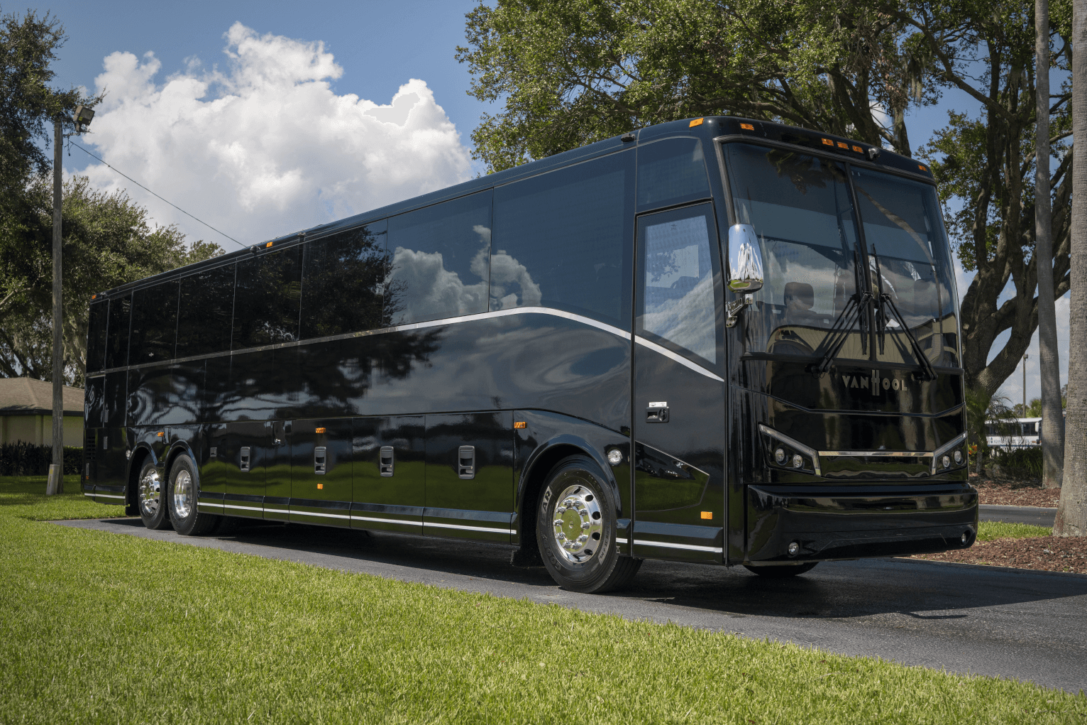 Bobby's Charters 56-passenger motorcoach with luggage bays and onboard restroom